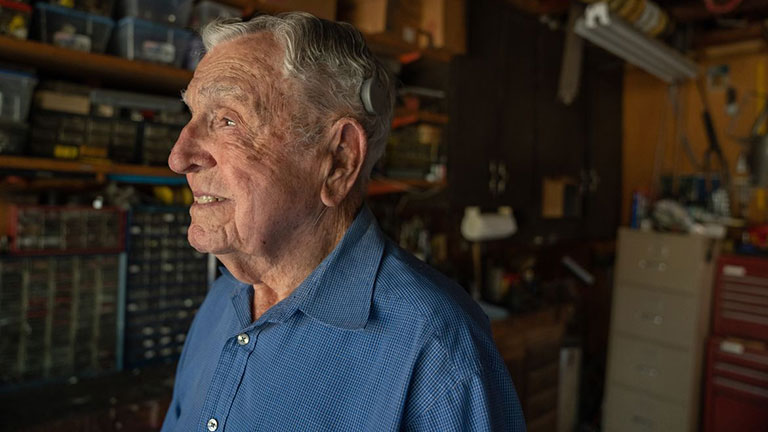 WWII veteran, 102, regains his hearing and social life, thanks to cochlear implant program